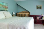 Upstairs bedroom with King bed and crib